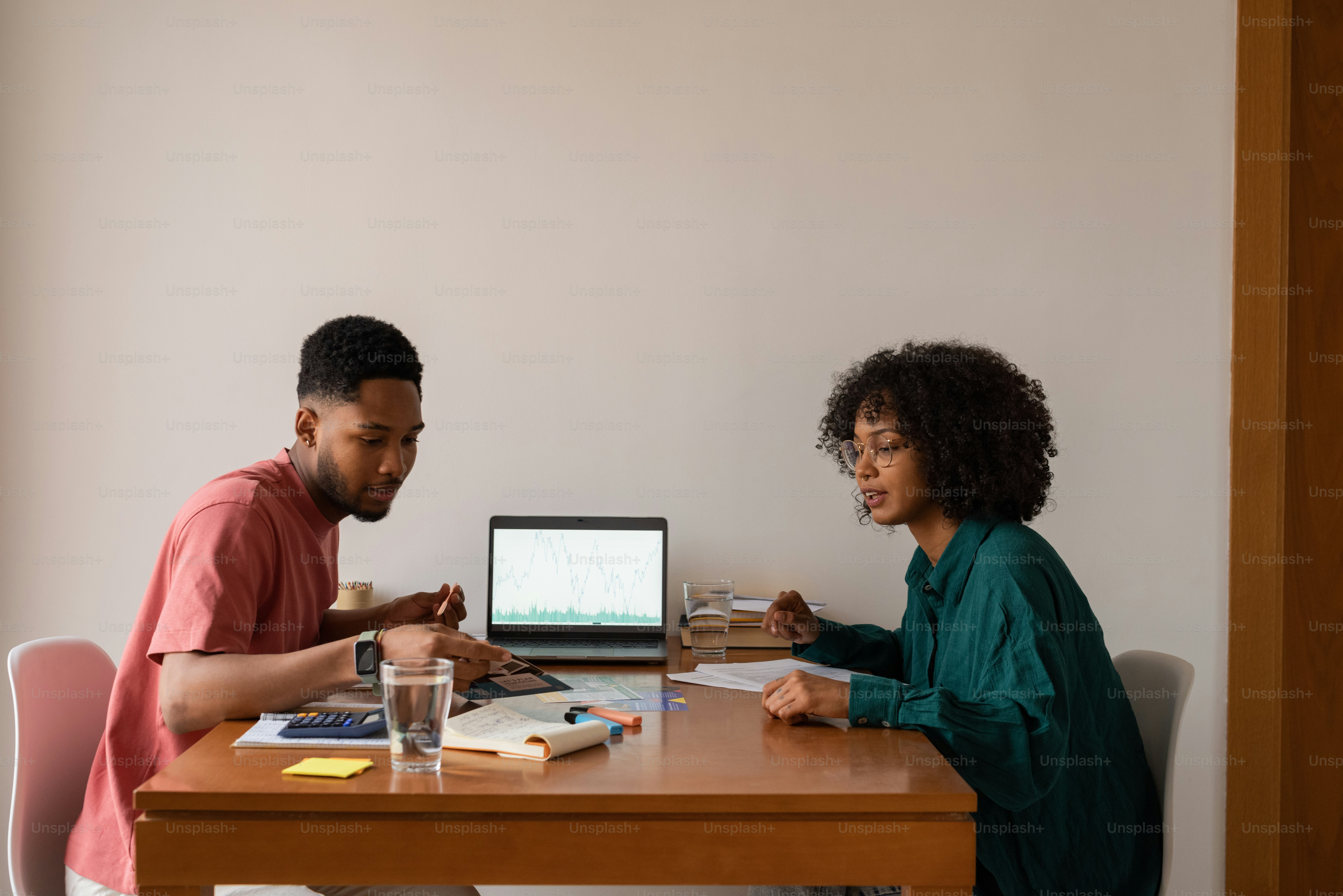 a man and a woman sitting at a table