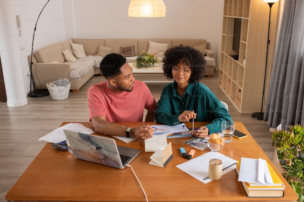 a man and a woman sitting at a table