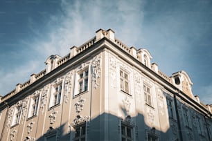 a tall building with a clock on the top of it