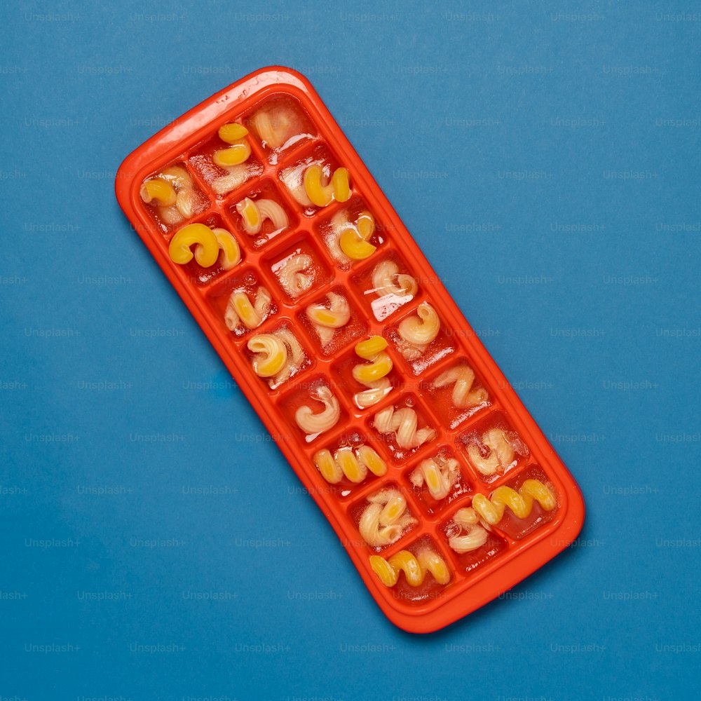 a plastic tray with letters and numbers in it