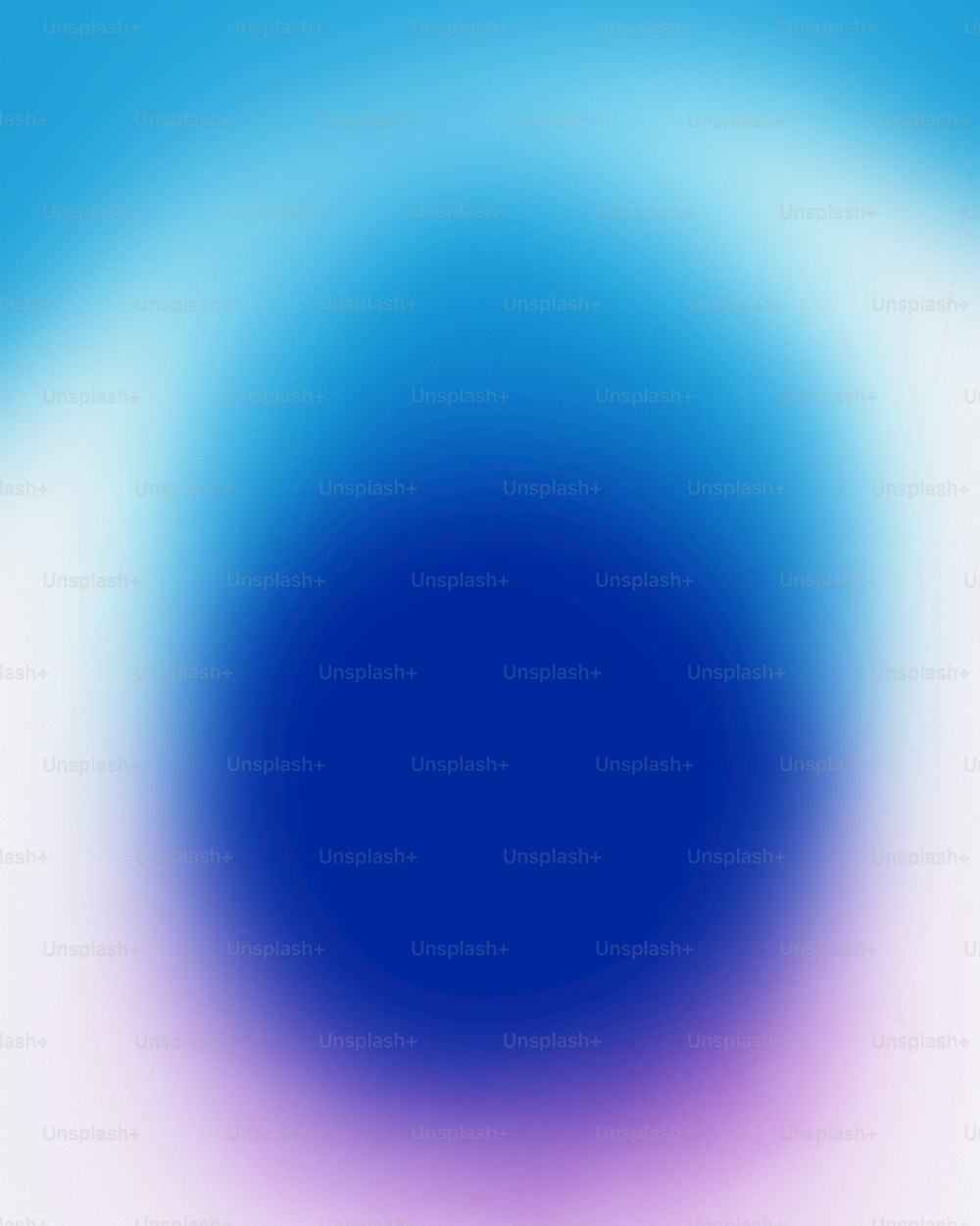 a blue and purple circular background with a white center
