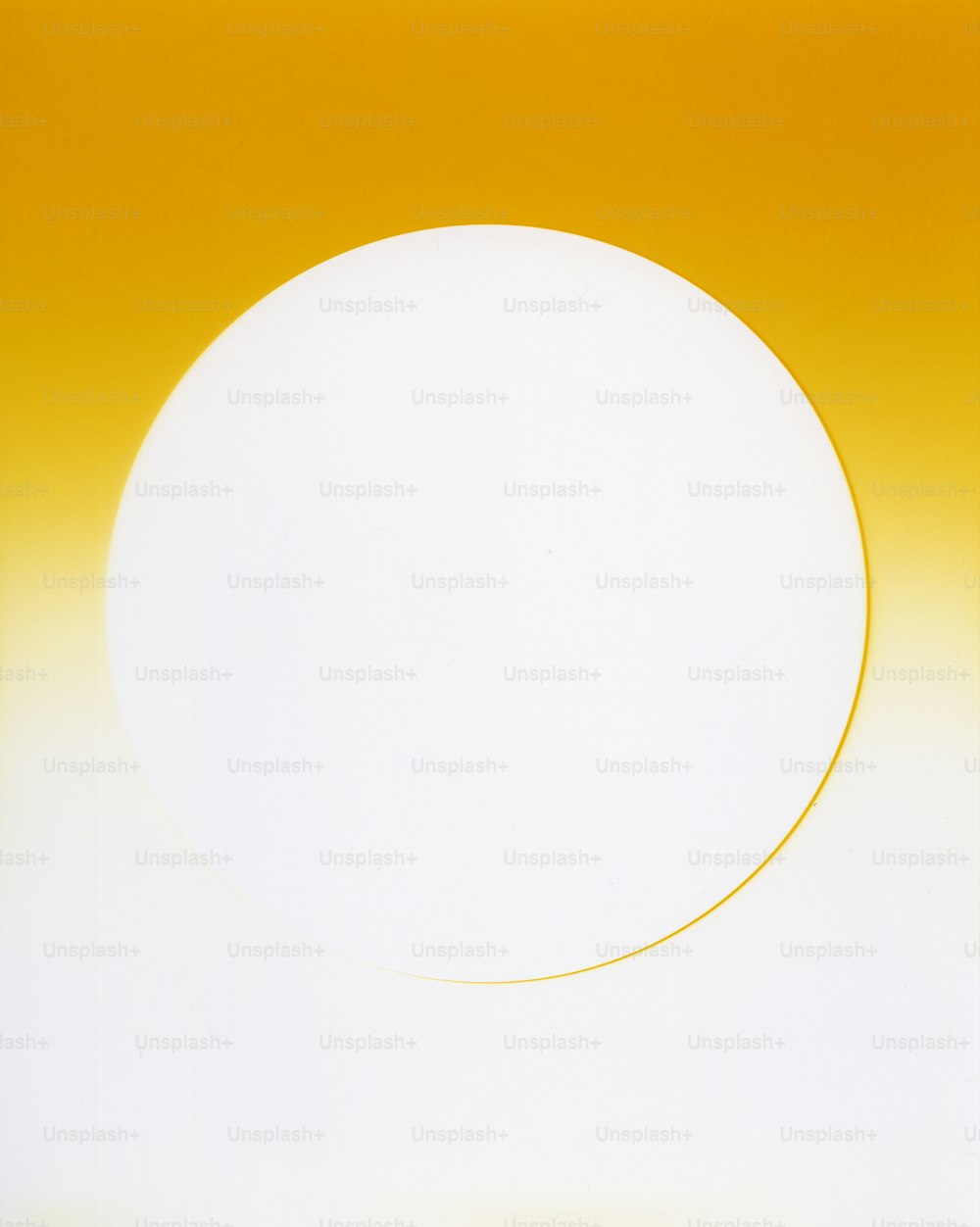 a white circle with a yellow background