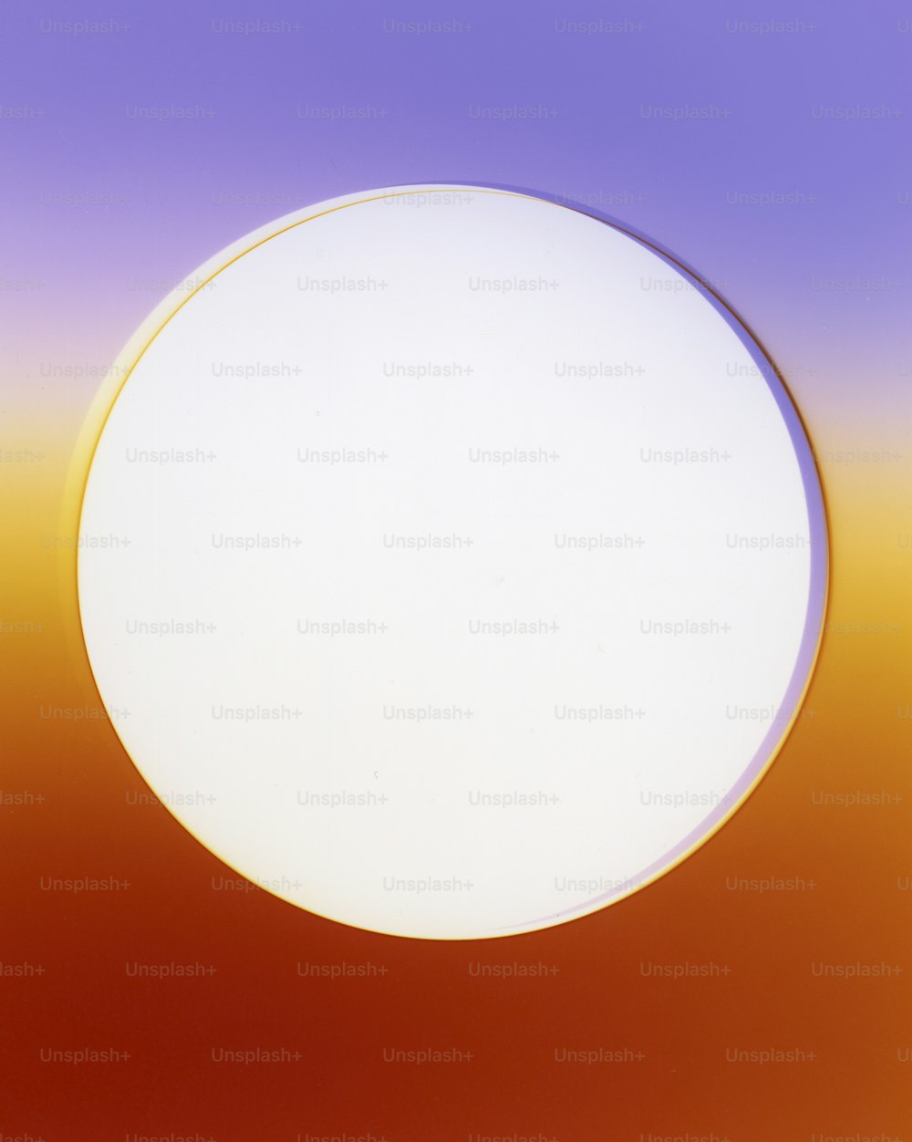 a white circle with a purple and yellow background