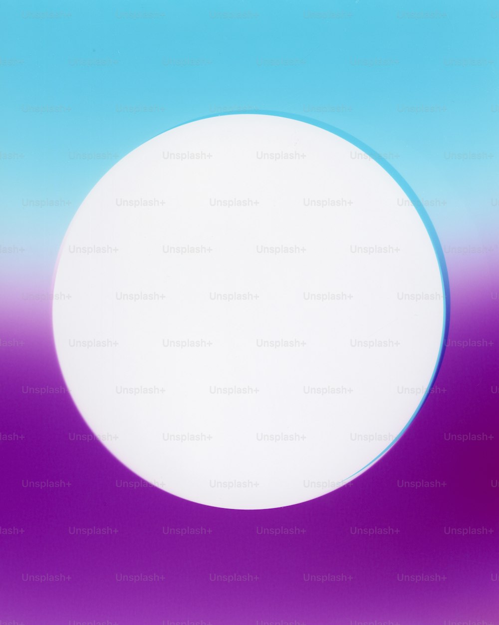 a white circle on a purple and blue background
