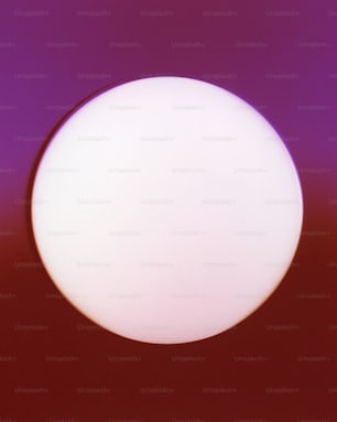 a white ball is in the middle of a purple background