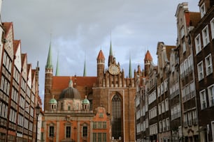 a large building with a clock on the top of it