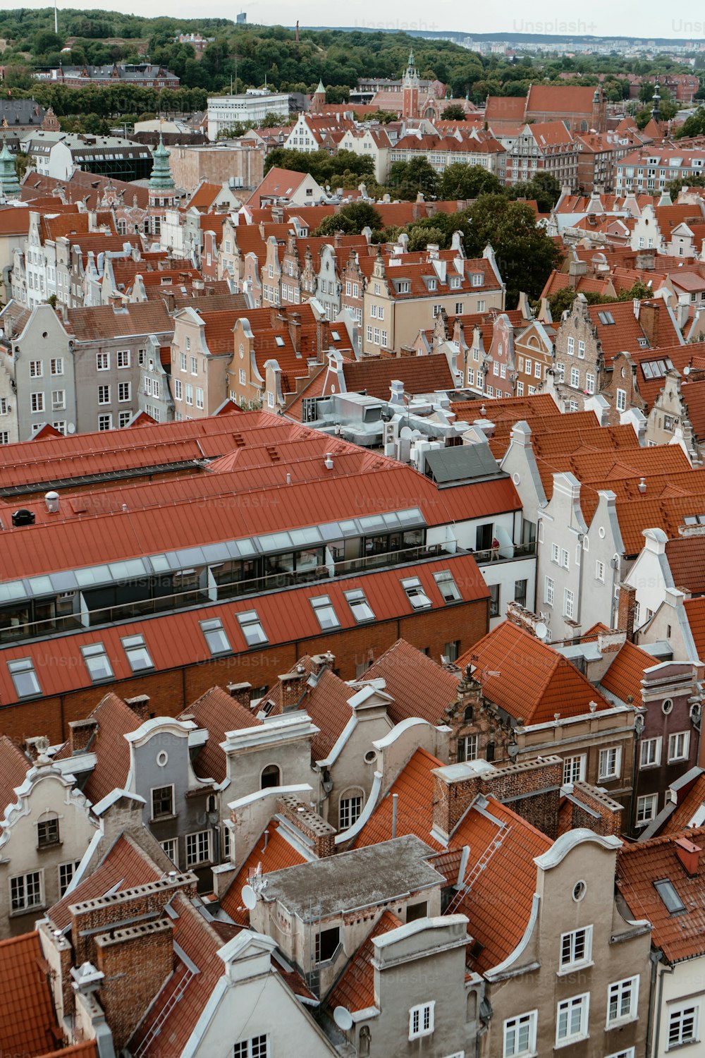 a view of a city with a train on the tracks