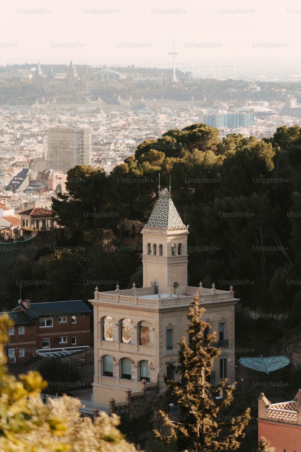 a clock tower on top of a building in a city