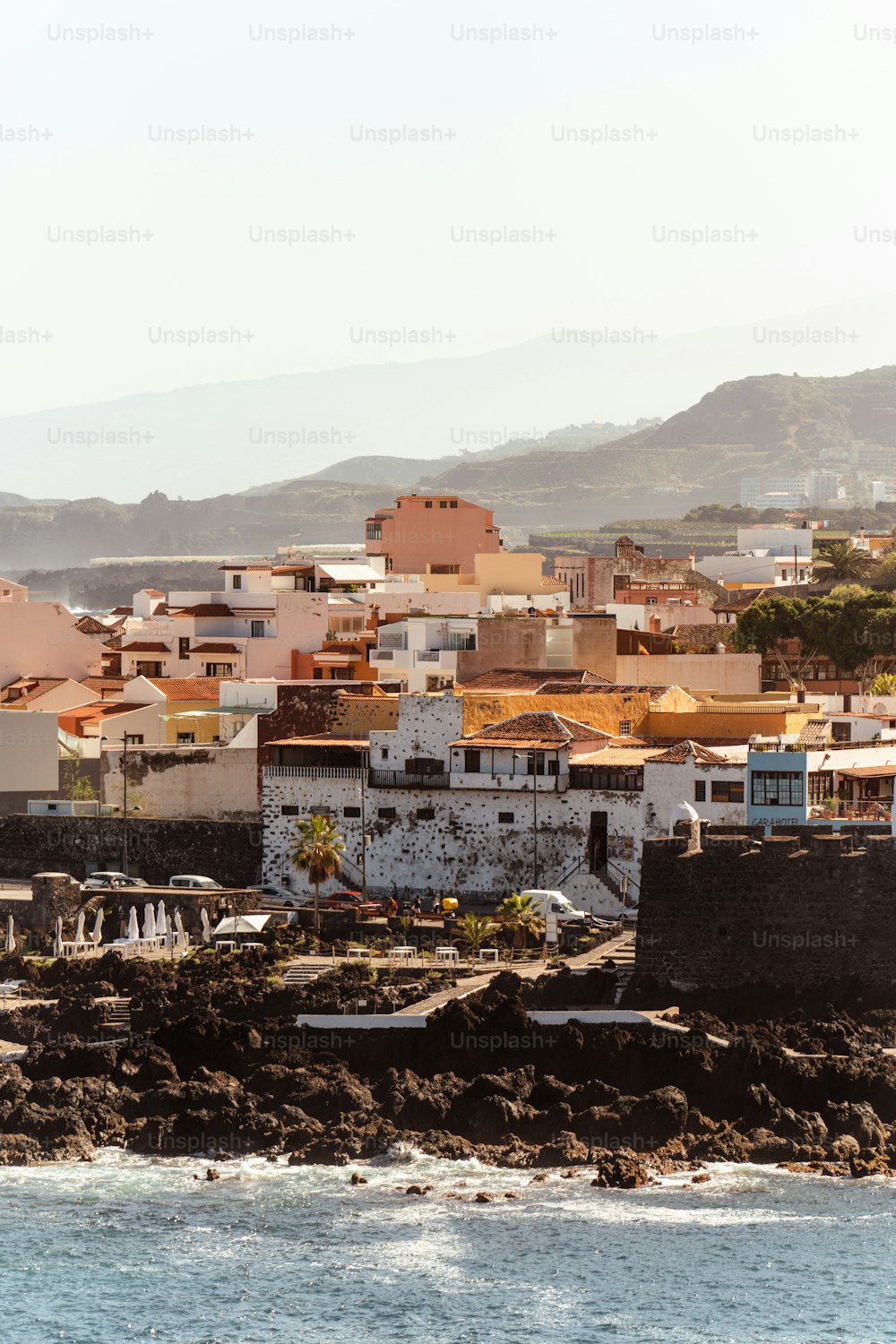 a view of a city from the ocean