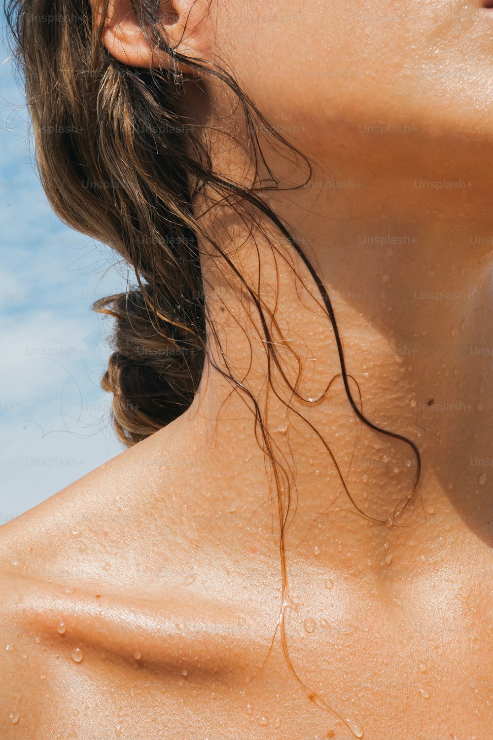 a close up of a person with wet hair