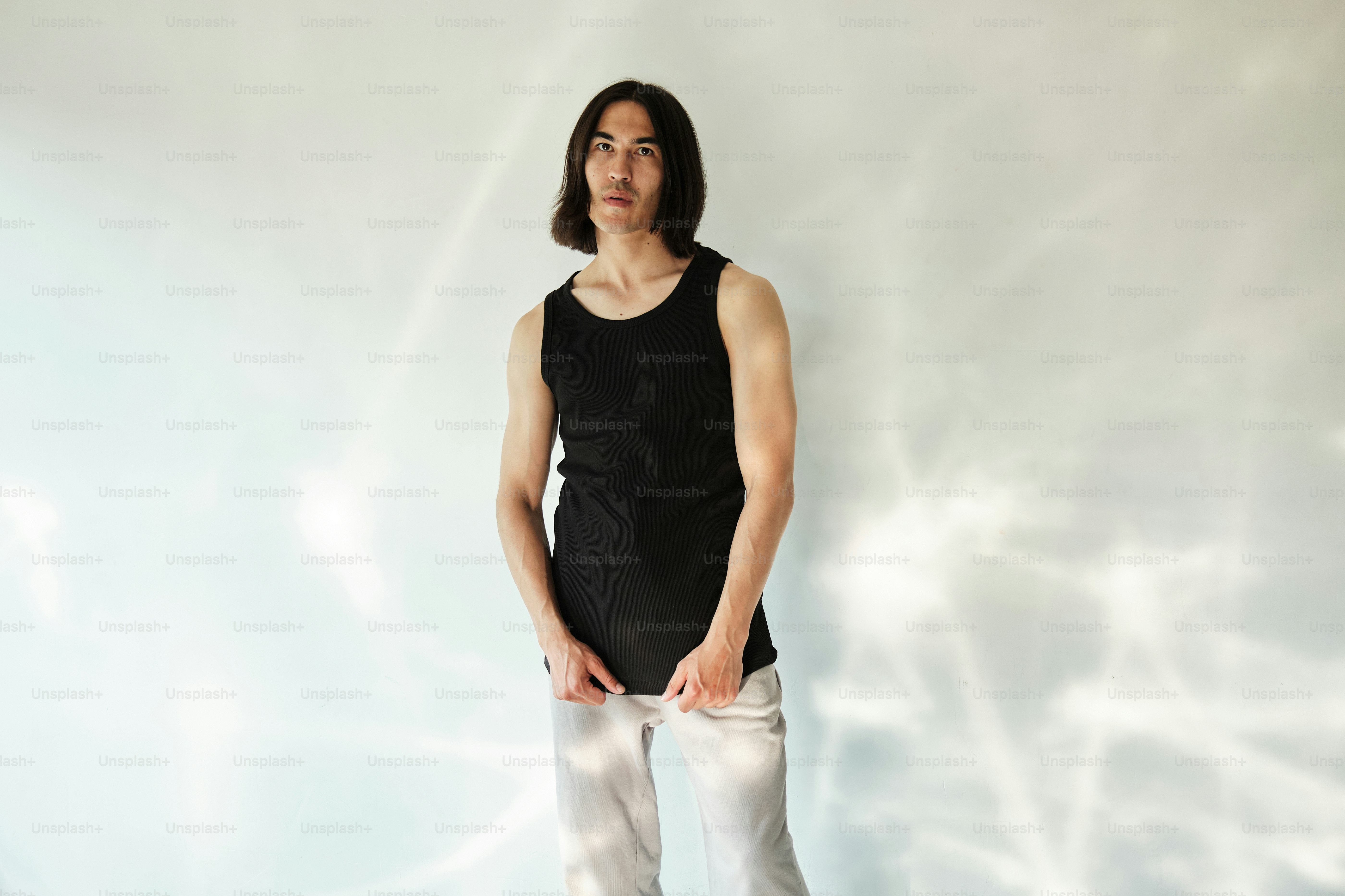 portrait of a man in basic tank top