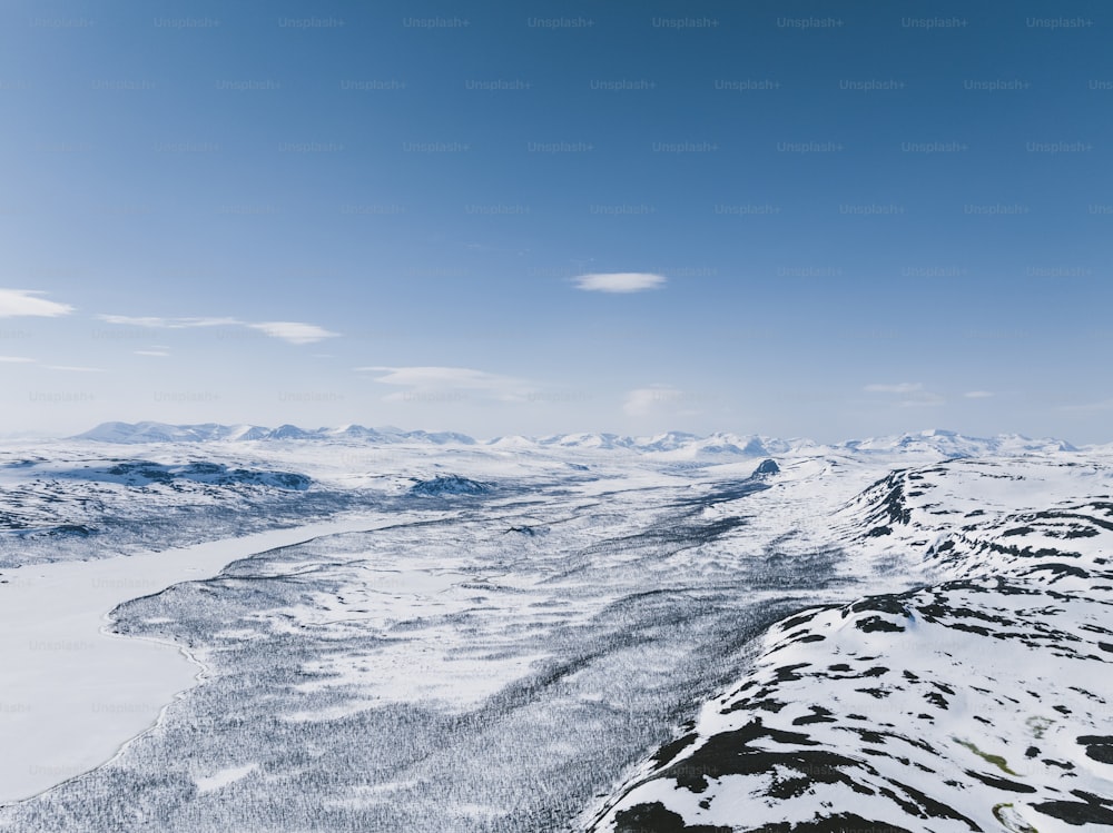 a view of a snow covered mountain range