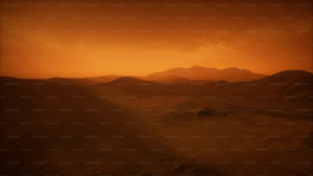 a desert landscape with mountains in the distance