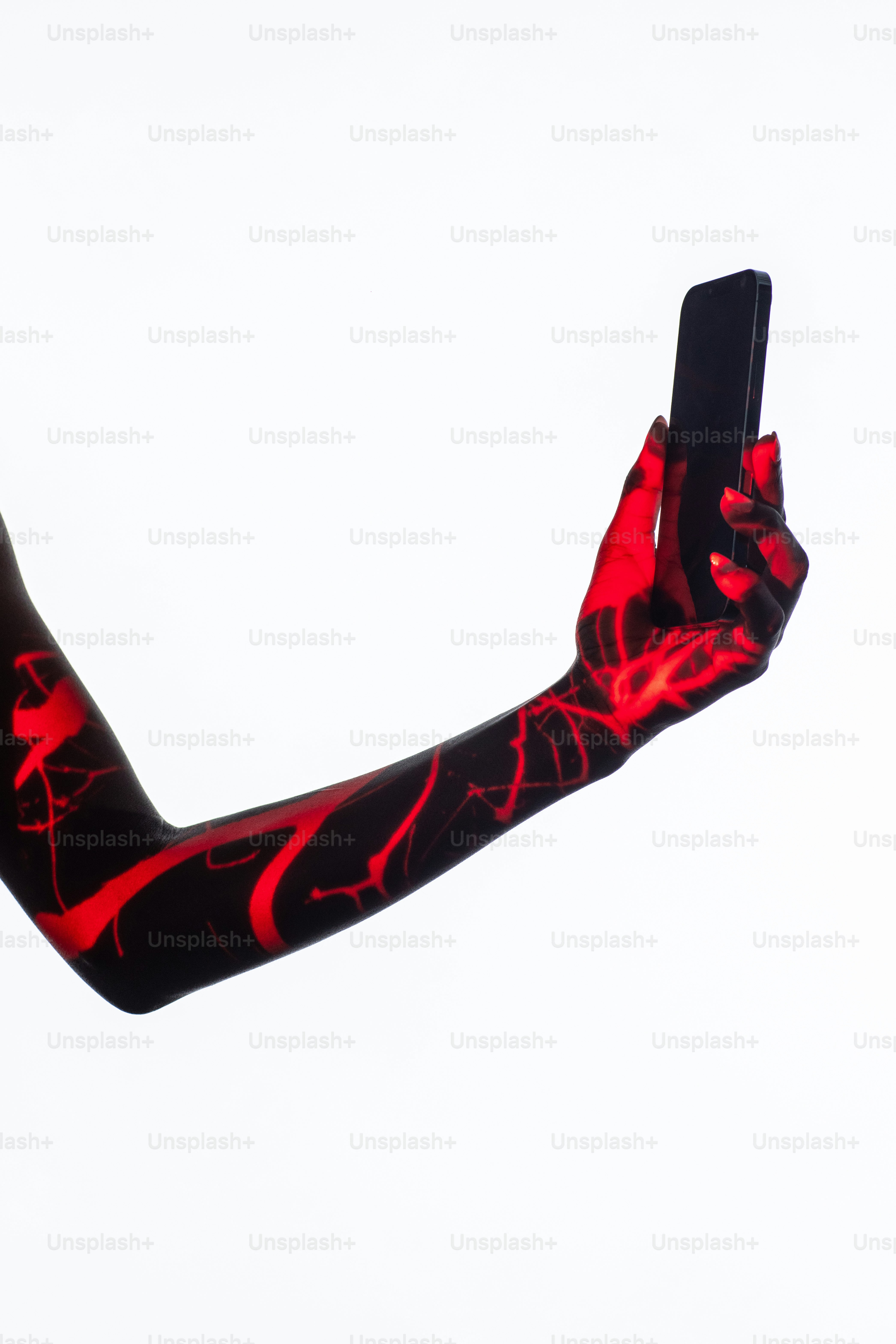 a person with a cell phone in their hand