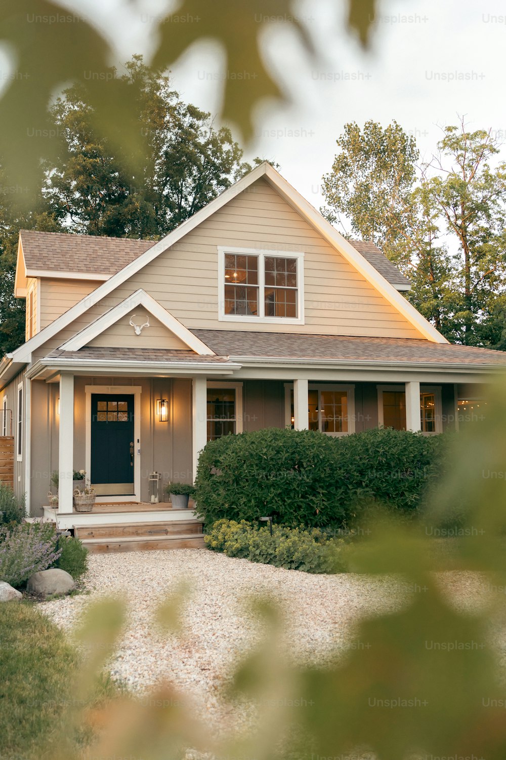 a house with a blue front door and a brown front door