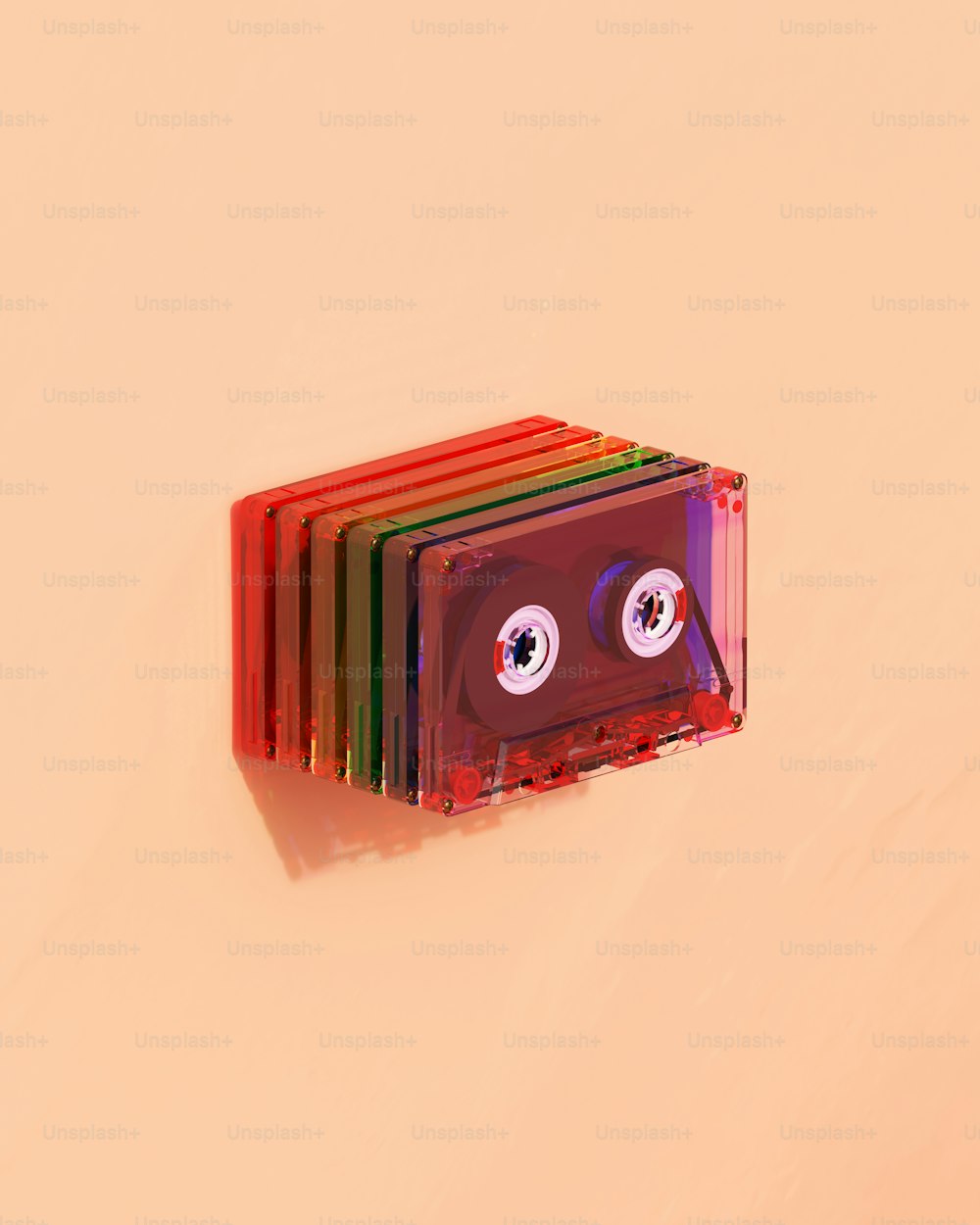 a stack of cassettes with eyeballs on them