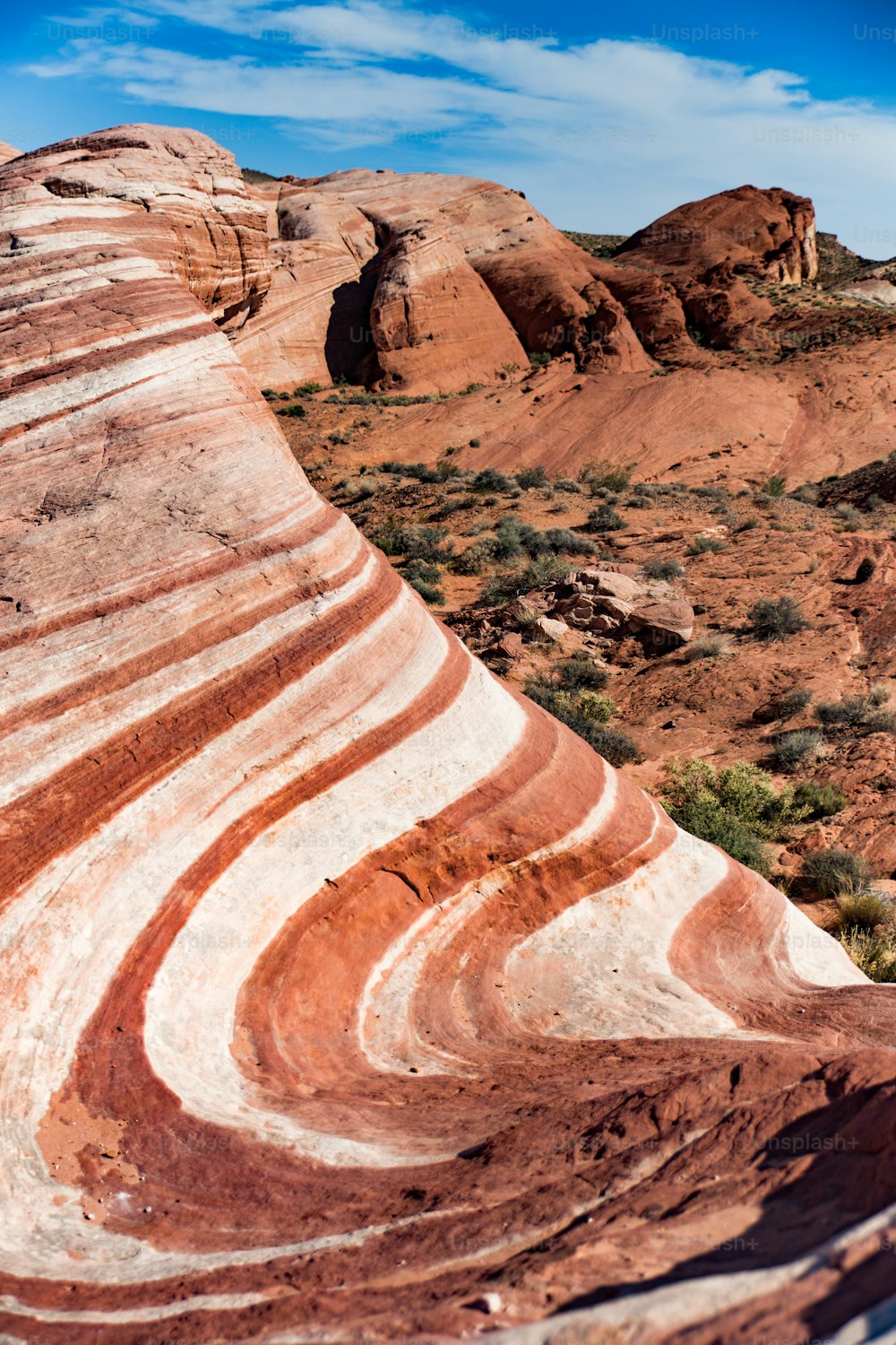 a large rock formation in the middle of a desert