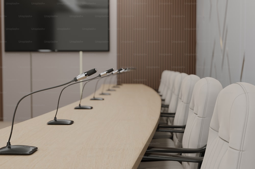 a row of chairs sitting in front of a wooden table