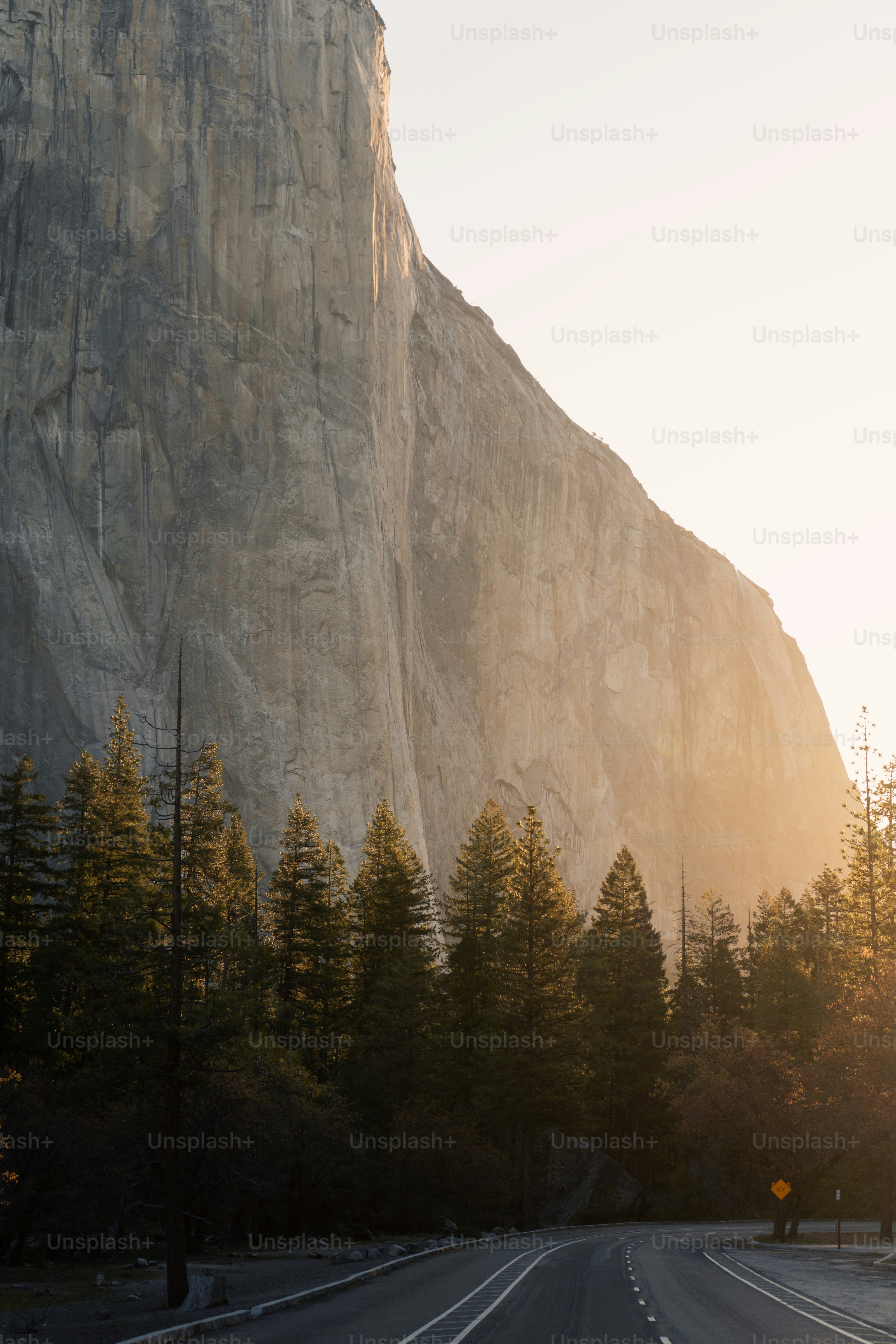 a road with a mountain in the background