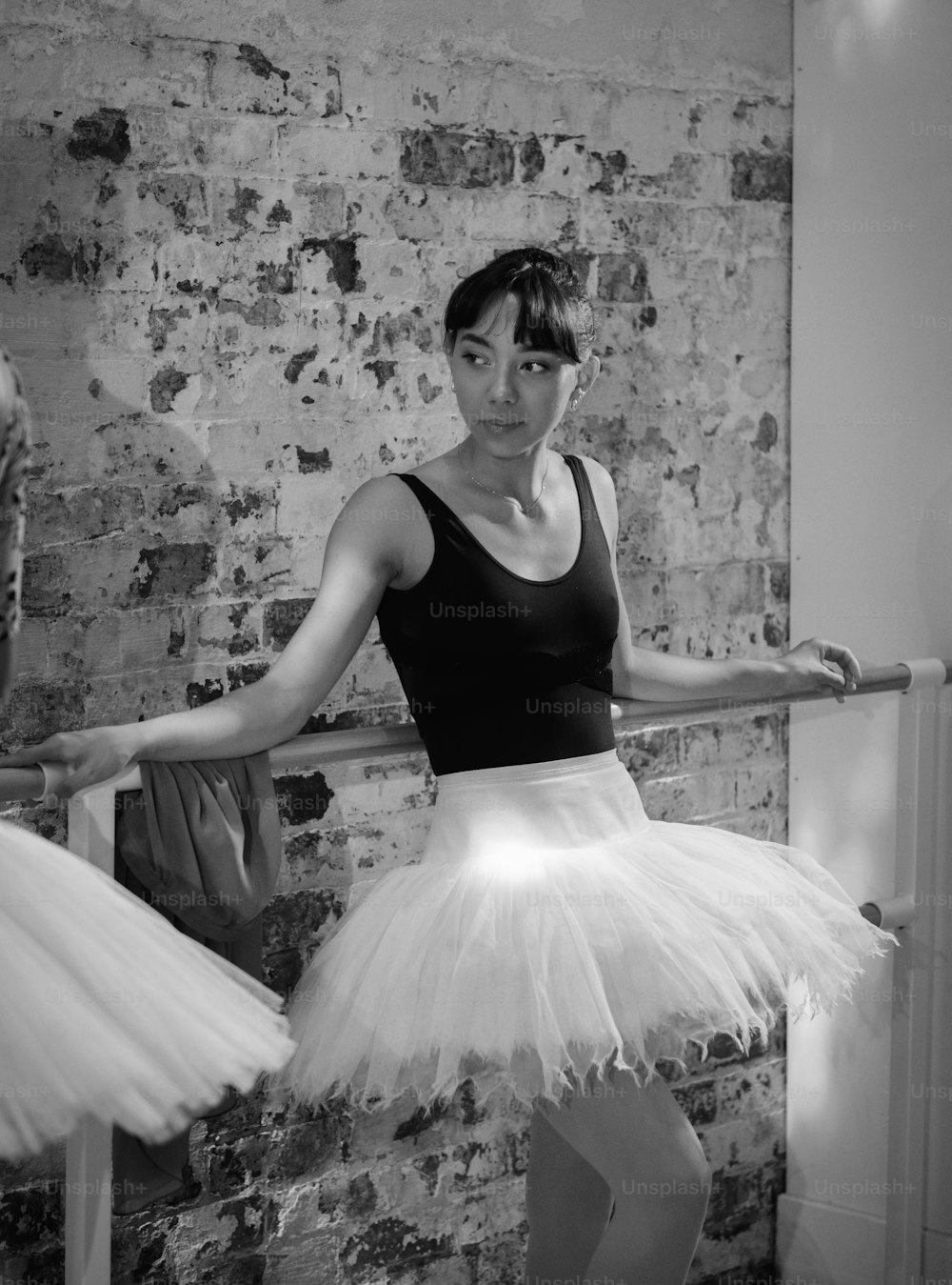 a woman in a tutu posing for a picture