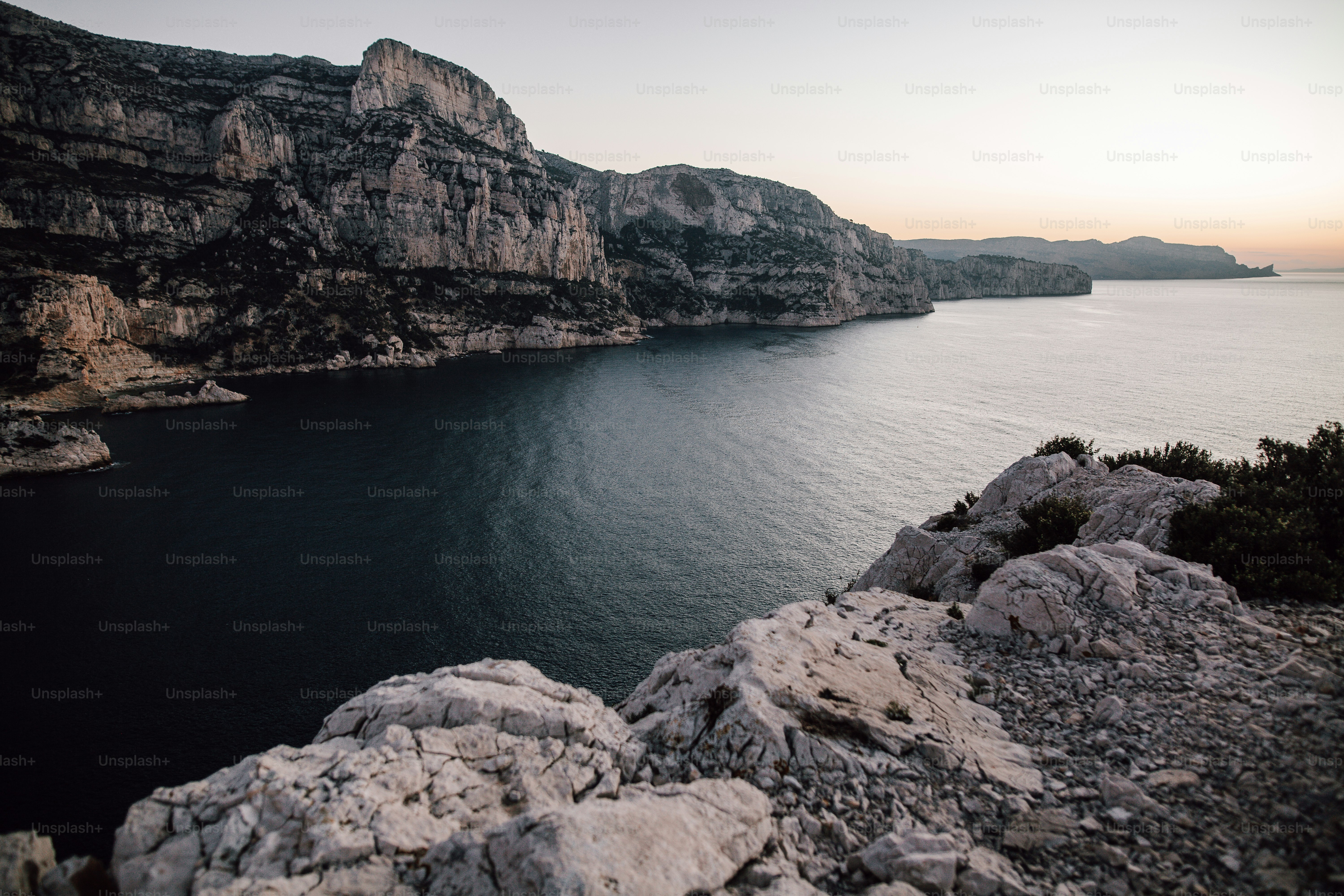 a large body of water surrounded by mountains
