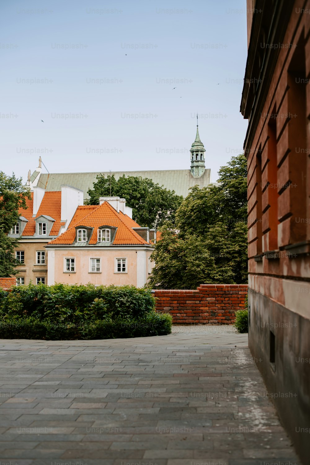 a building with a clock tower in the background