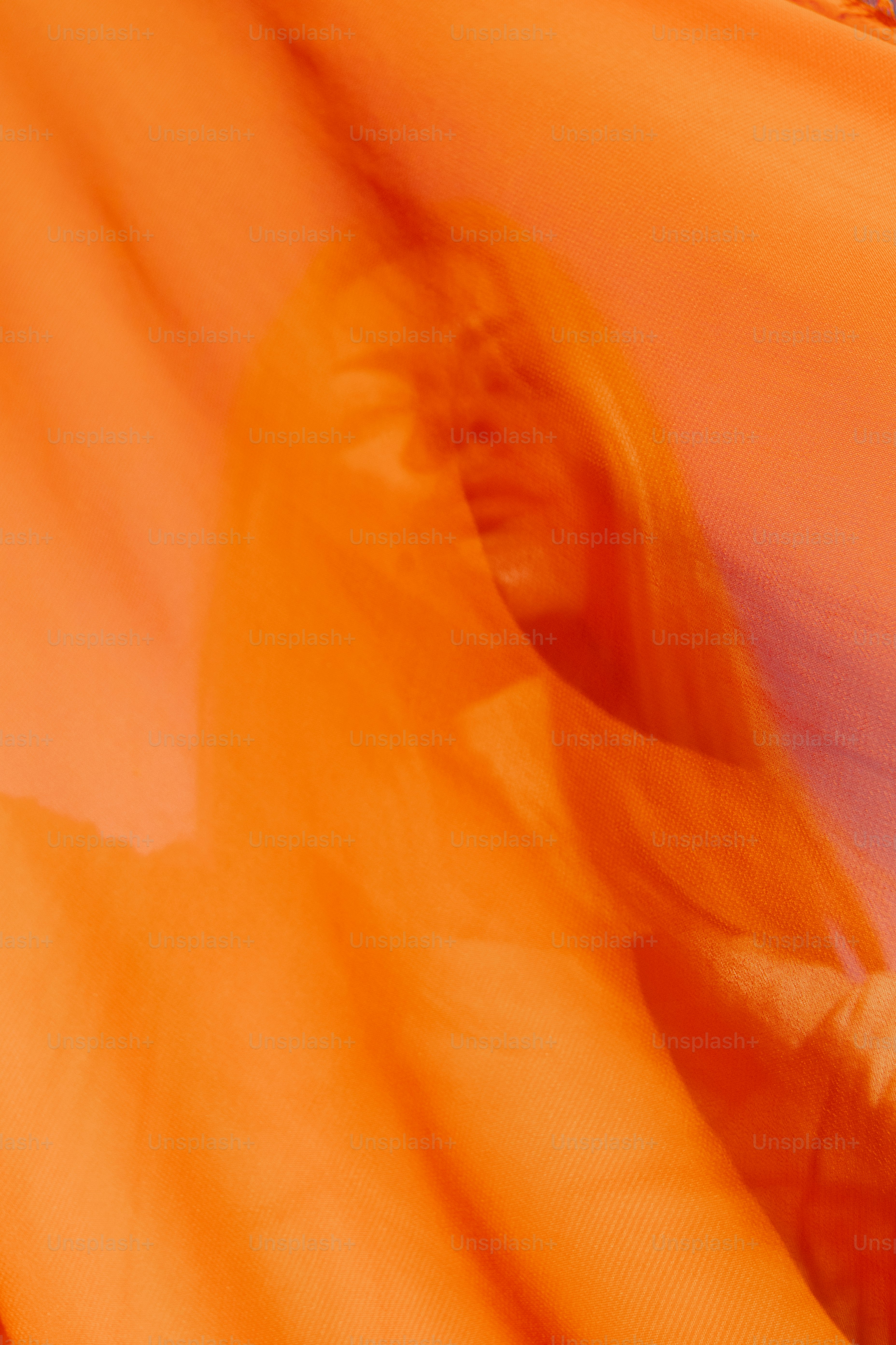 a blurry image of a person wearing a tie