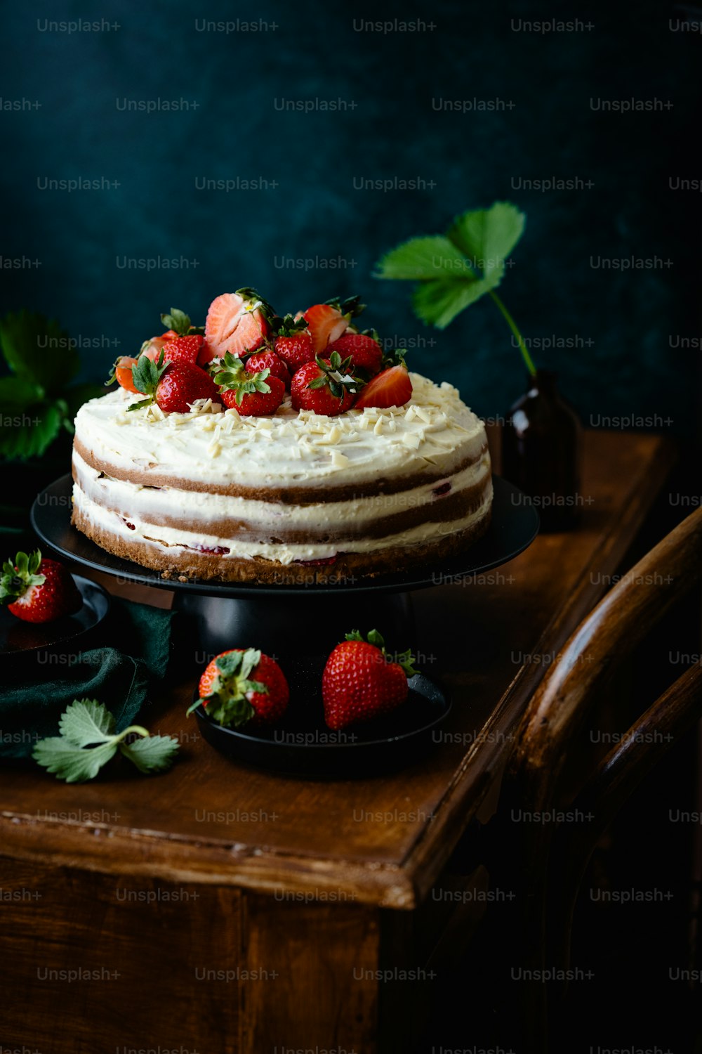 a cake sitting on top of a wooden table