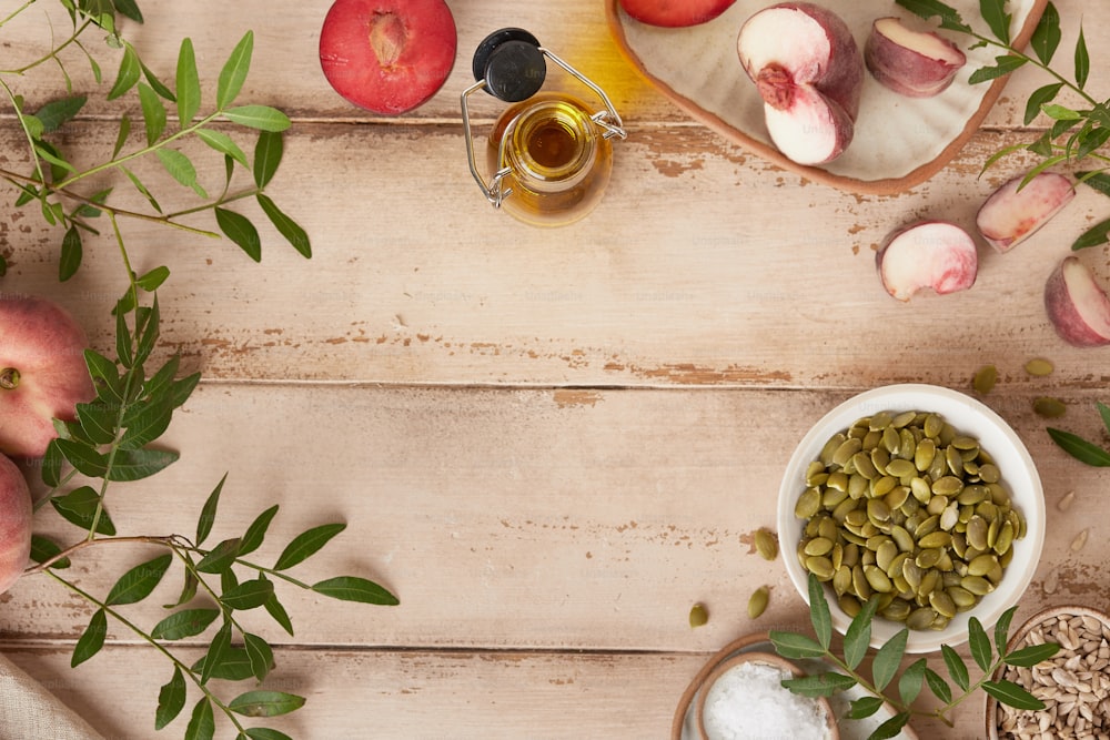 a wooden table topped with fruits and vegetables