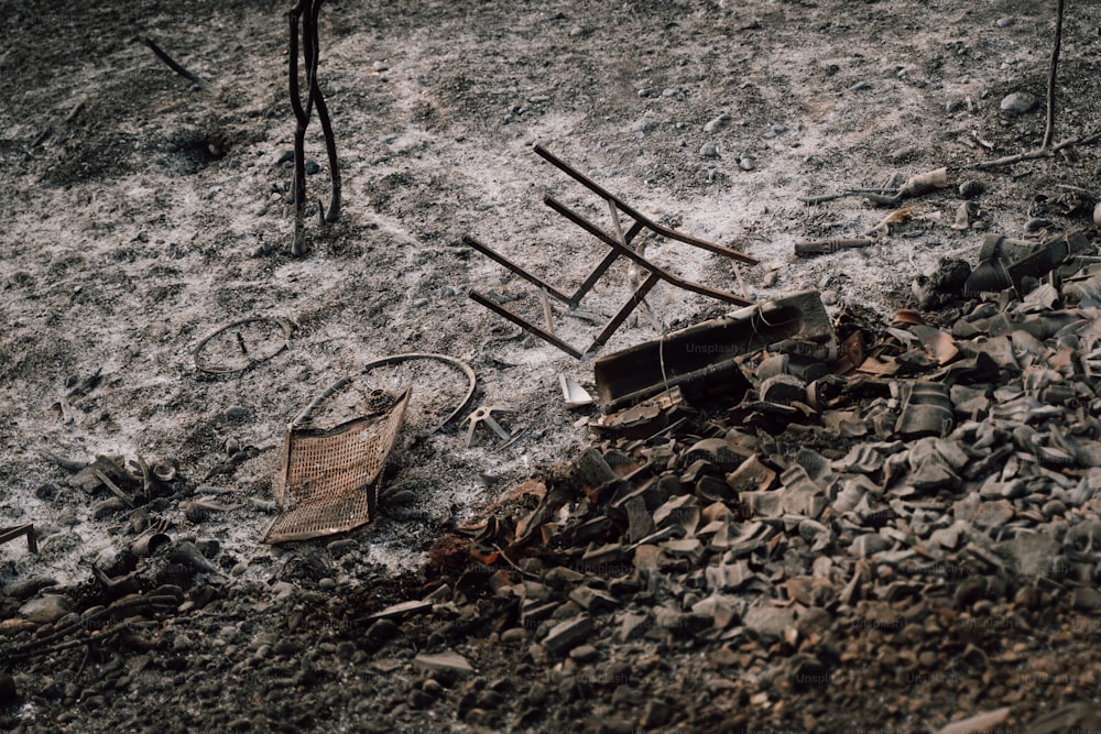 a pile of rubble sitting next to a fence