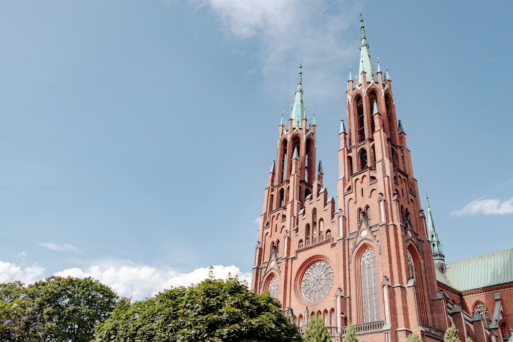 a large cathedral with a clock on the front of it