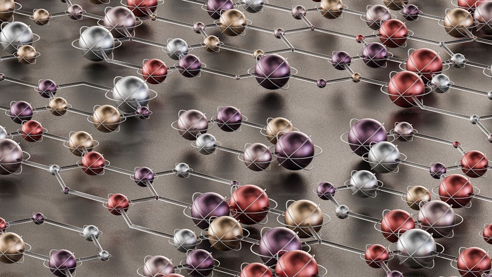 un gruppo di sfere di metallo con colori diversi su di esse