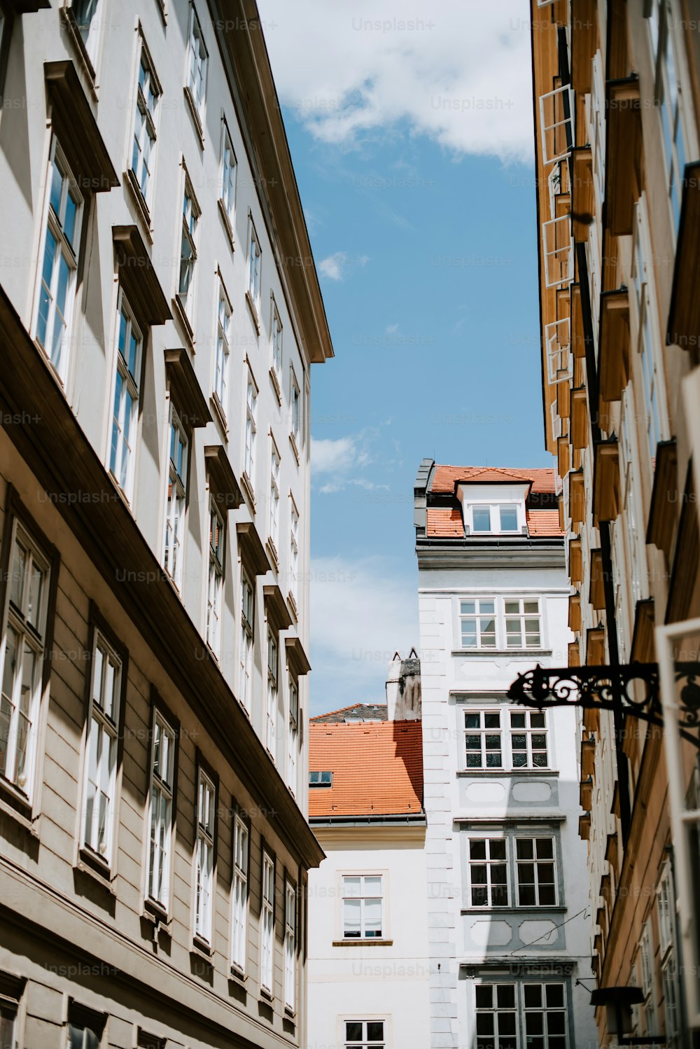 a view of some buildings from the street