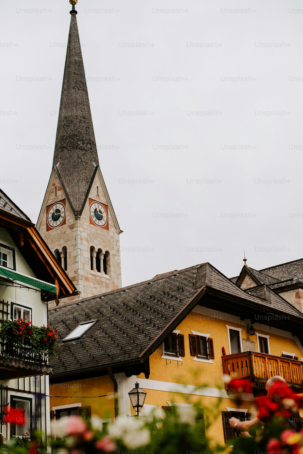 a building with a steeple with a clock on it