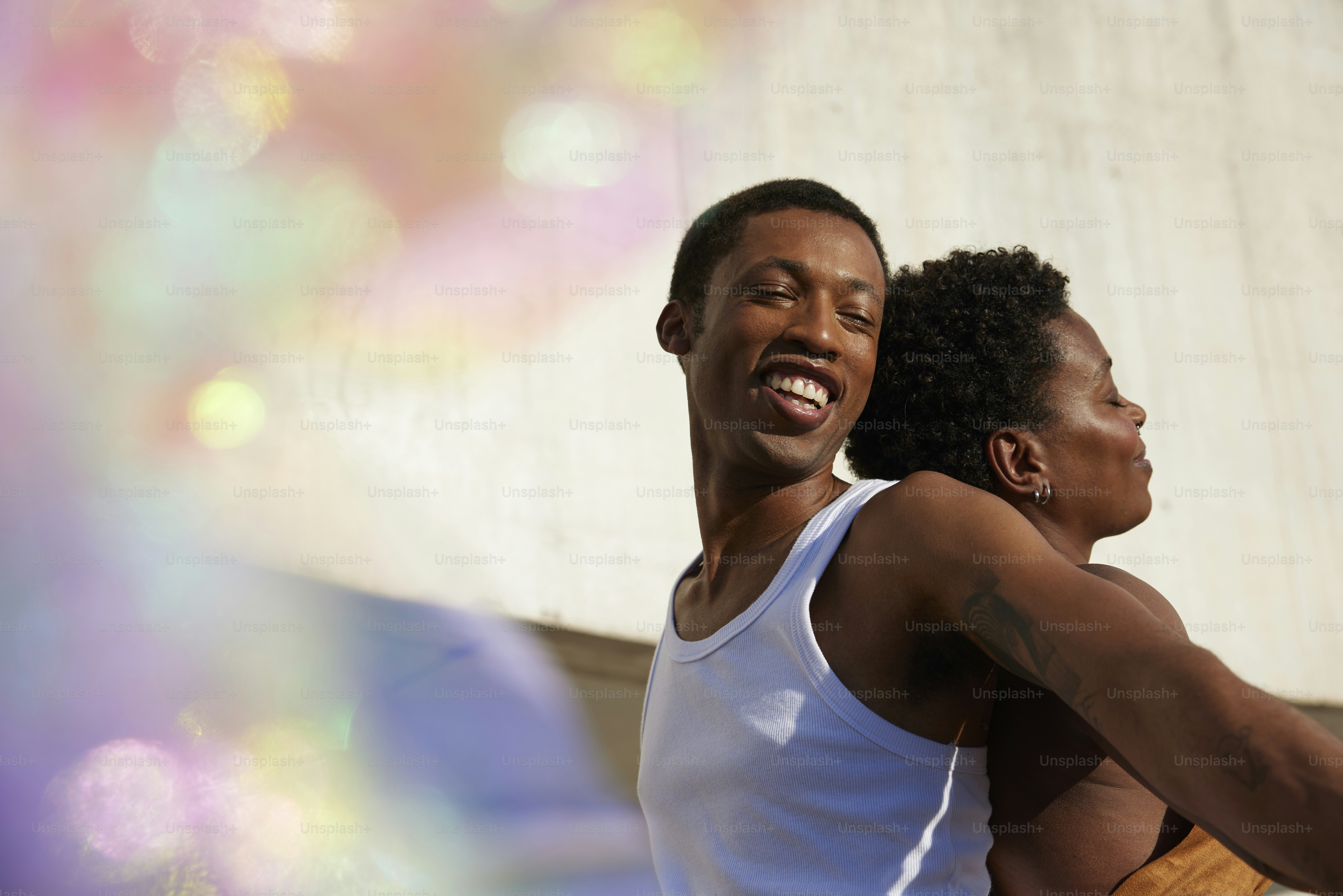 a couple of people that are hugging each other