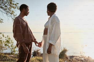 a man and a woman standing next to each other