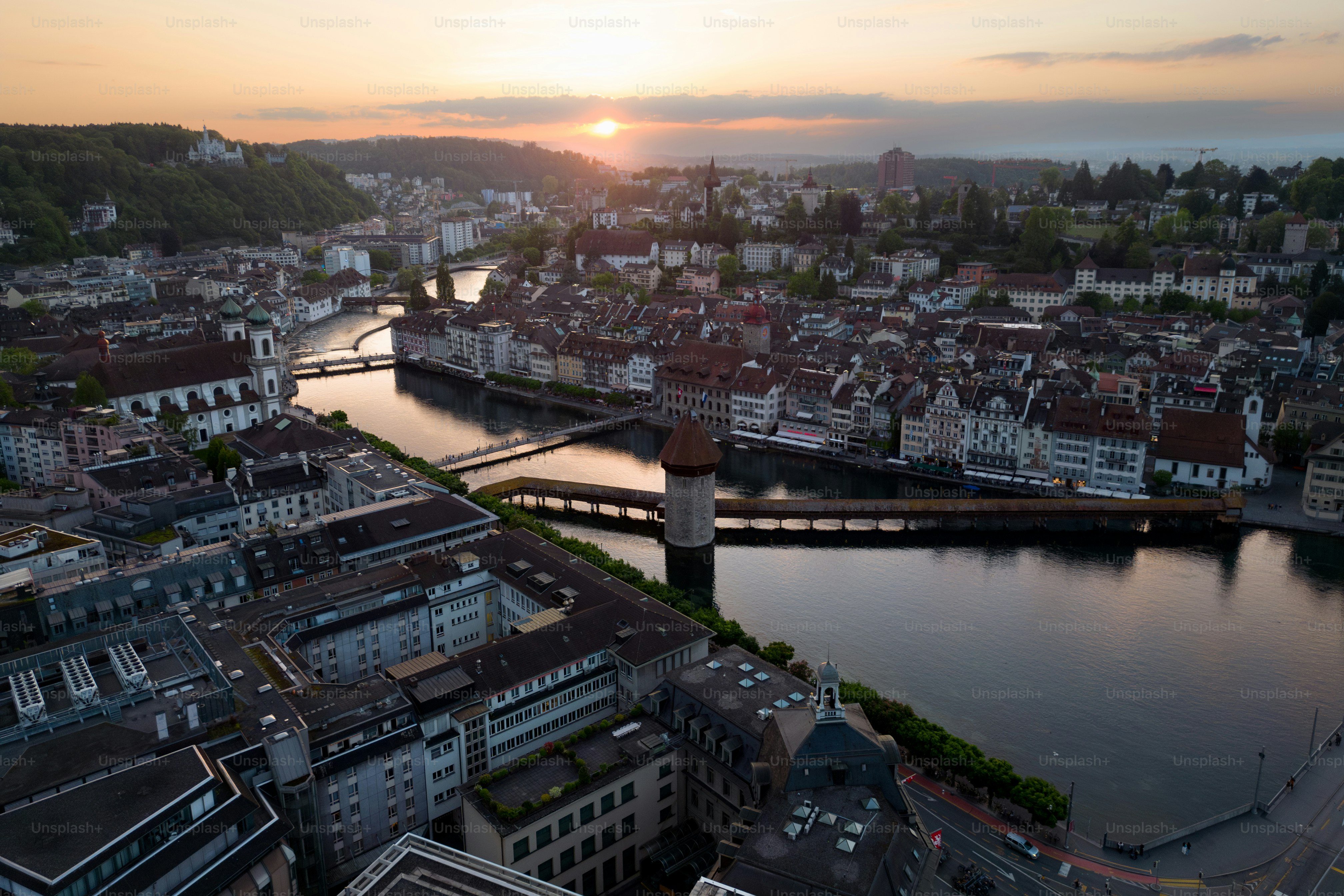 a river running through a city next to a bridge