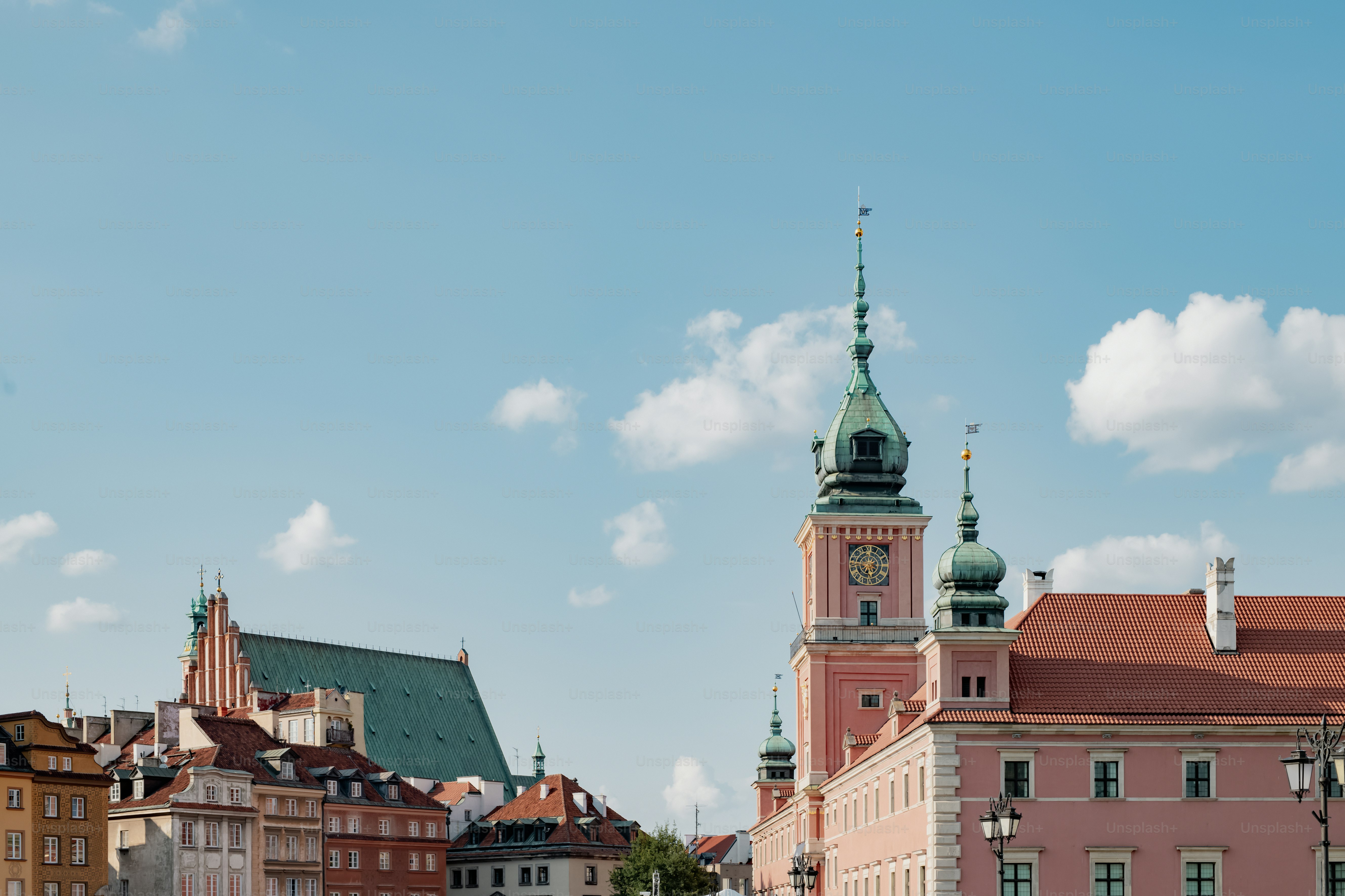 a large building with a clock on the top of it