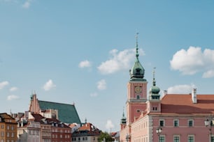 a large building with a clock on the top of it