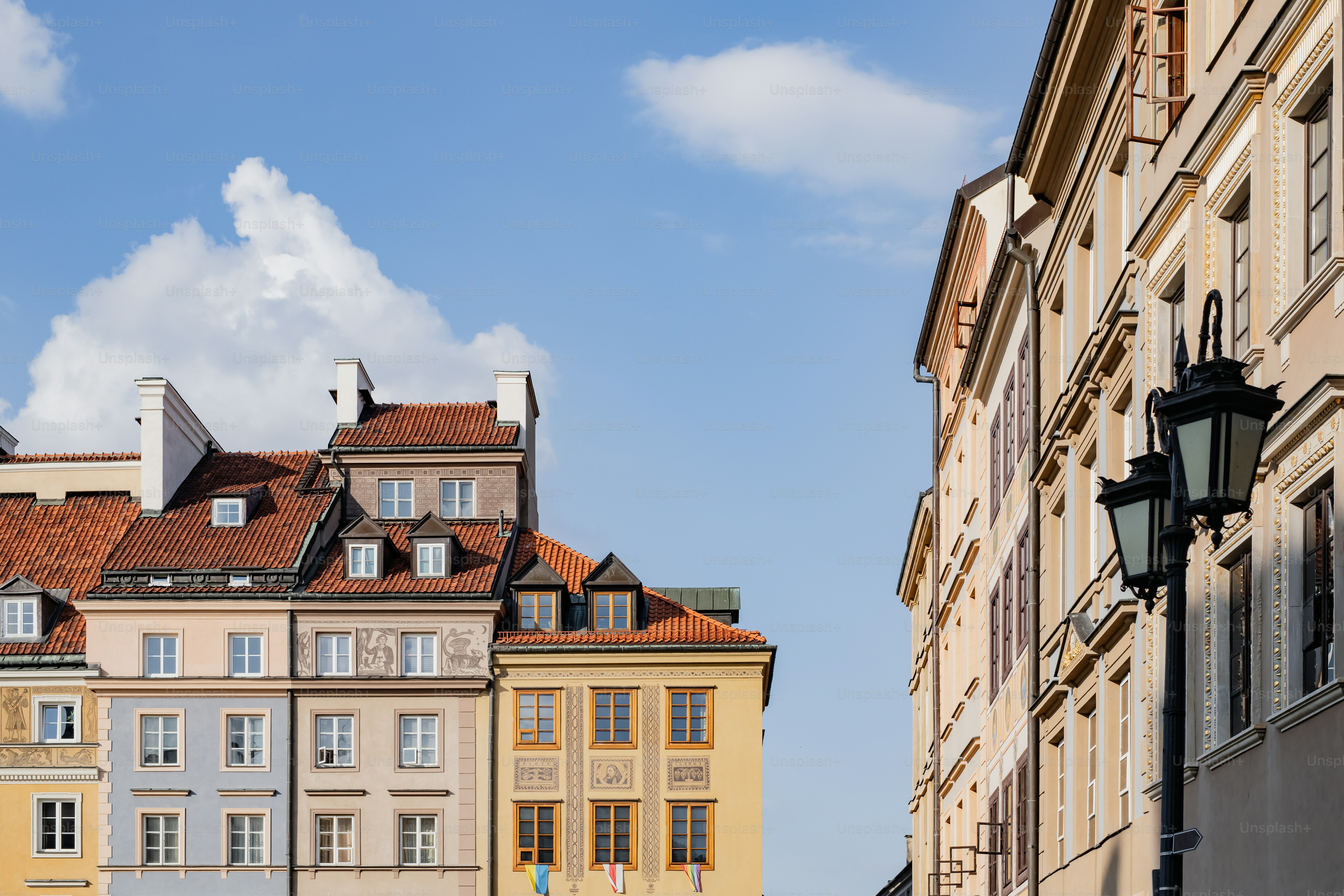 a row of buildings with a sky background