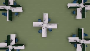 an overhead view of an office cubicle with chairs and desks