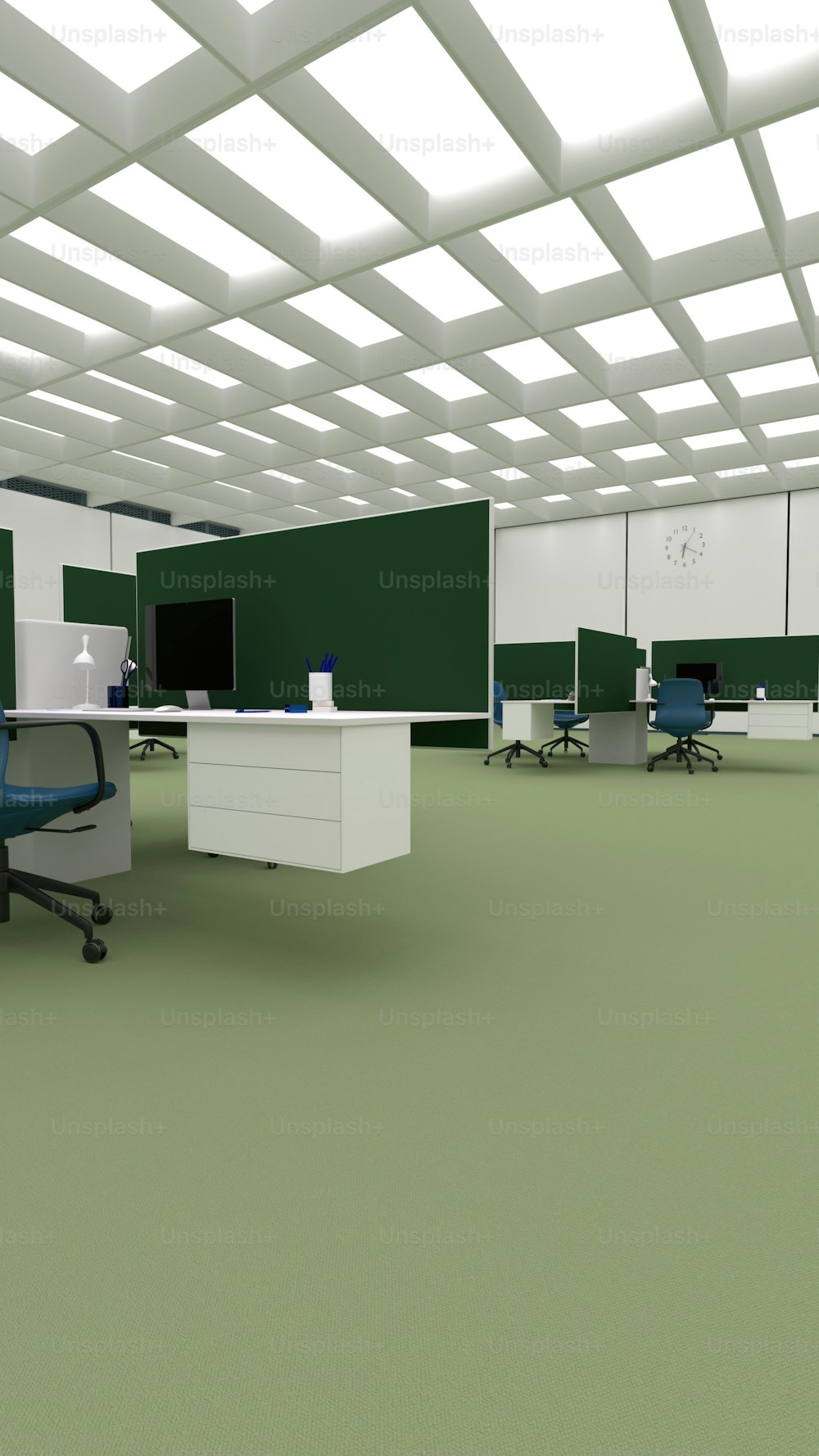 an office with a green wall and a white ceiling