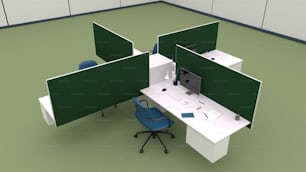 an office cubicle with two green screens and a blue chair