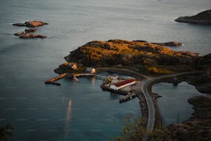 an aerial view of a small island in the middle of a body of water