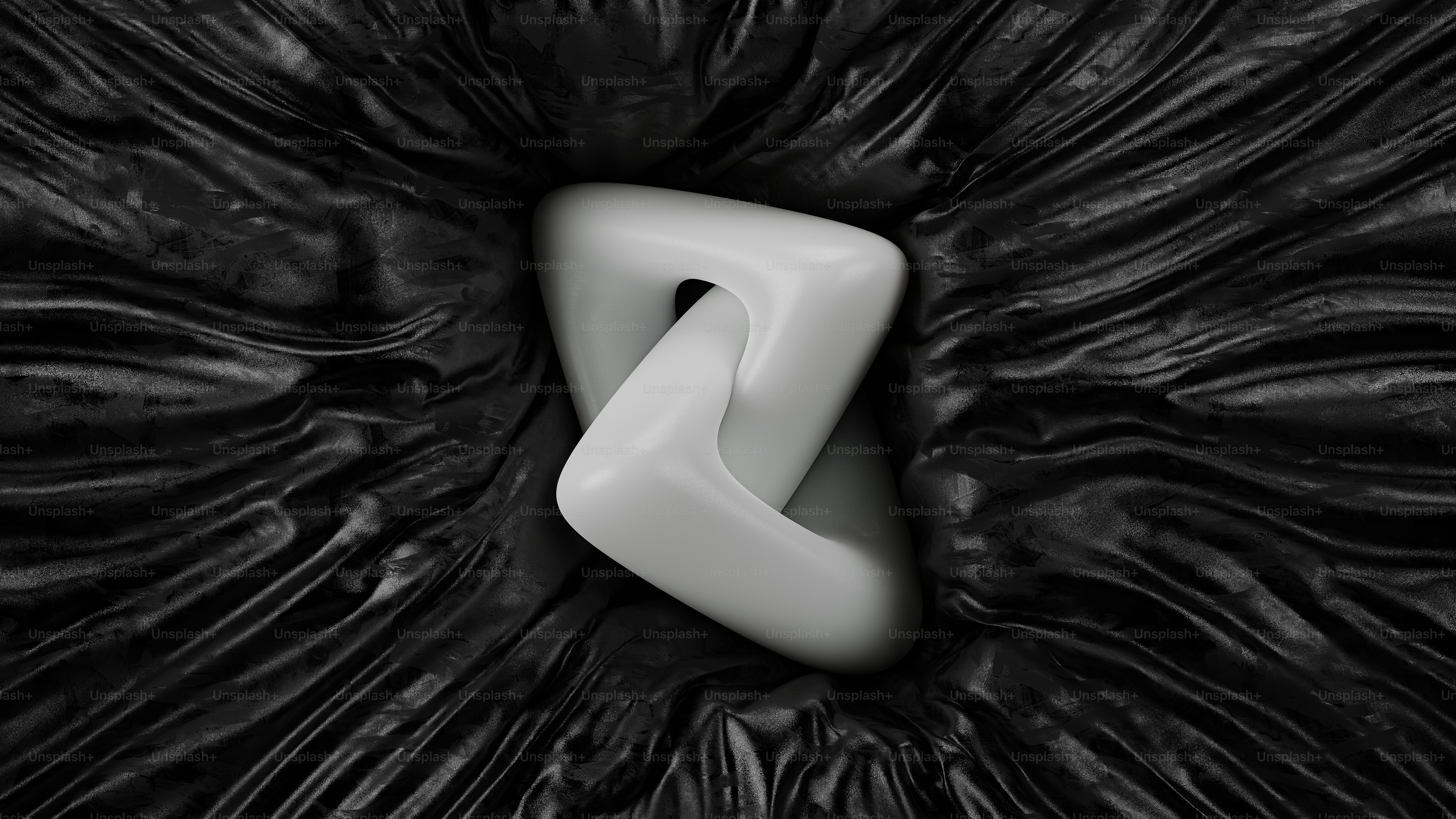 a black and white photo of a white object