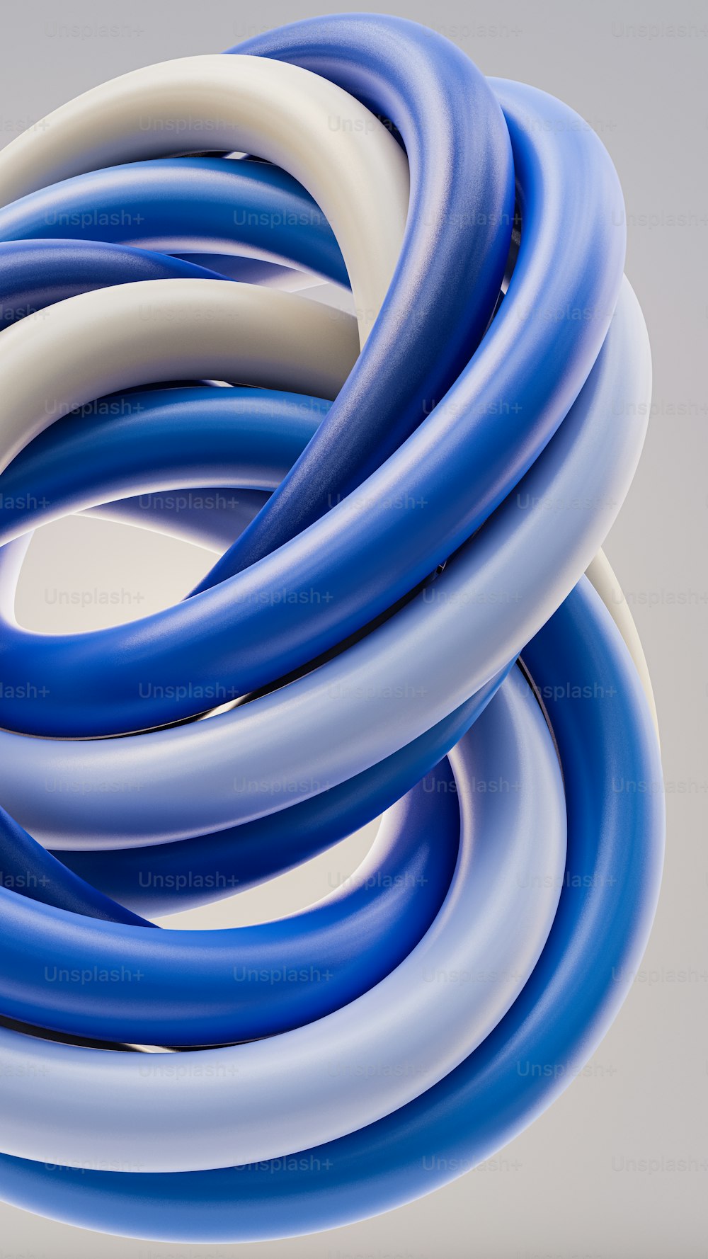 a group of blue and white hoses laying on top of each other