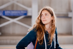 a woman with long hair and a blue shirt