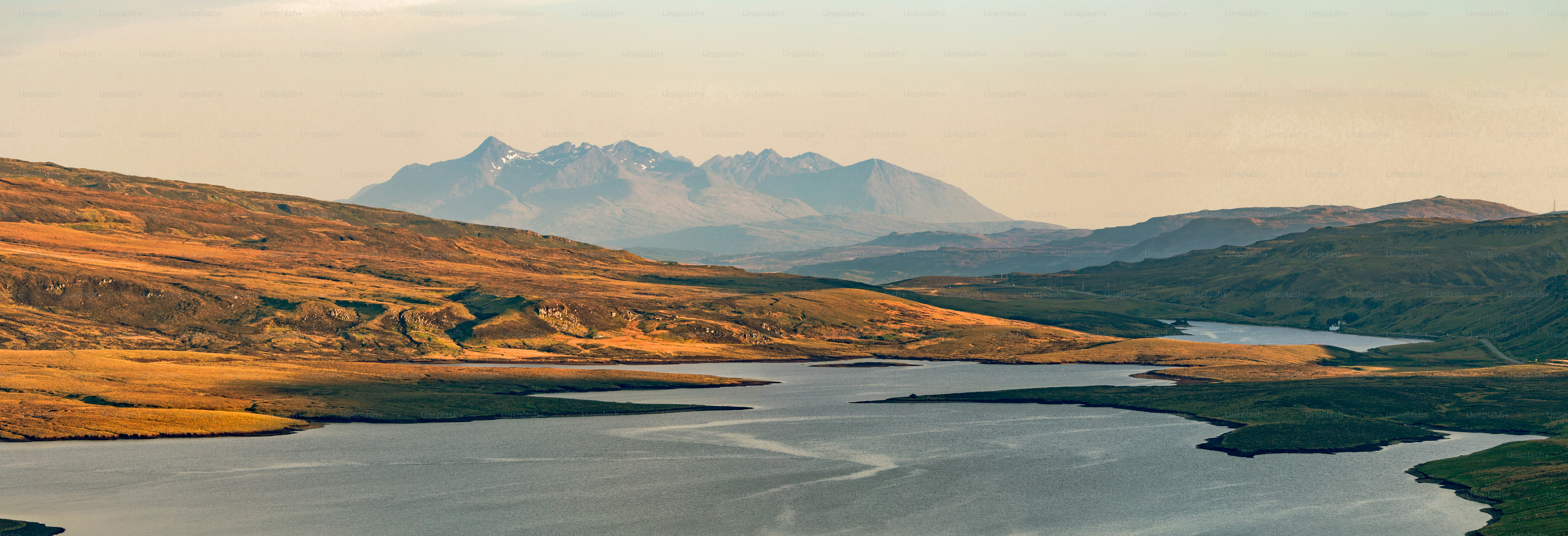 a large body of water surrounded by mountains