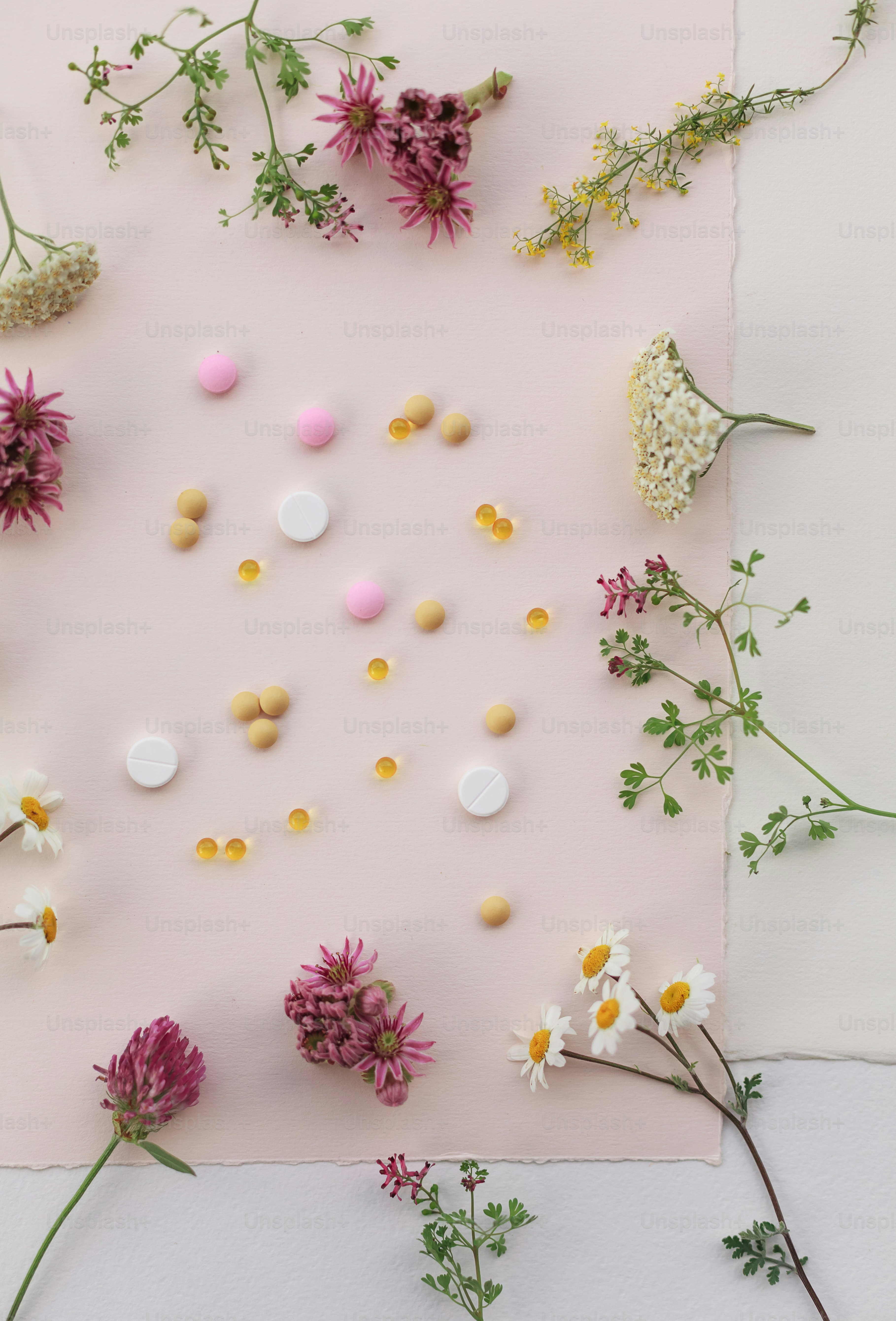 a bunch of flowers that are on a piece of paper