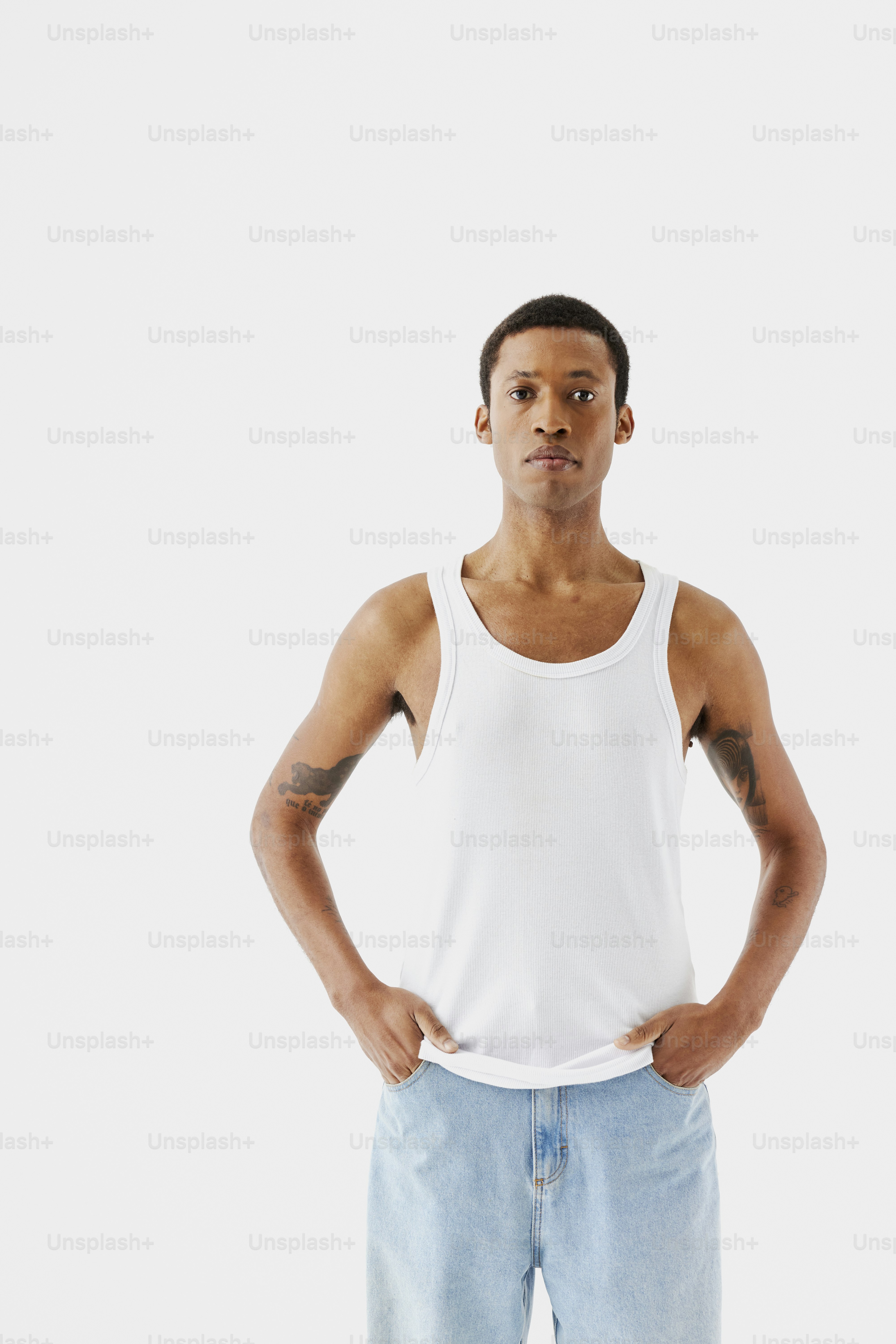 a man standing with his hands on his hips